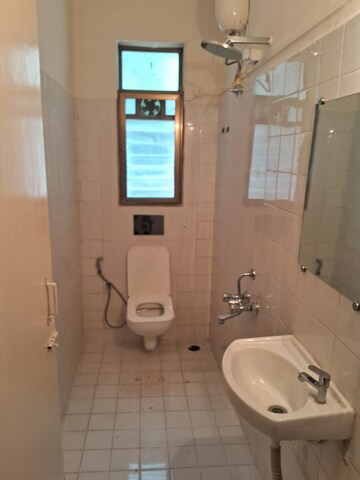 Bathroom in 2 BHK Apartment at Retreat Apartment, Santacruz West – for Sale