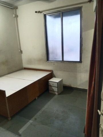 Bedroom in 1 BHK Apartment at Jagrut CHS, Gokhalenagar – for Rent
