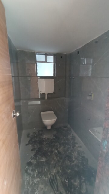 Bathroom in 2 BHK Apartment at Shree Nidhi Heights, Mira Road – for Rent