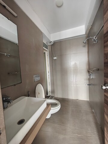 Bathroom in 3 BHK Apartment at Akshar Alvario, Seawoods – for Rent