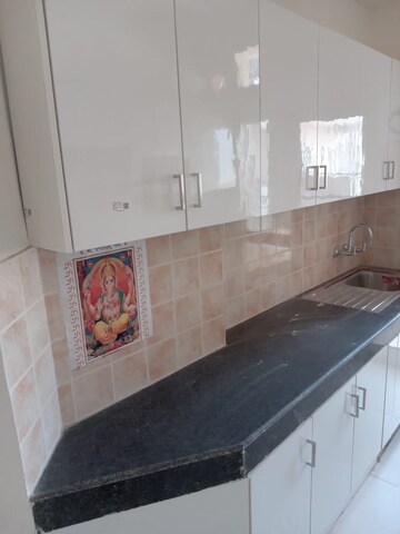 Kitchen in 3 BHK Apartment at Ramprastha Awho, Sector 95 – for Rent