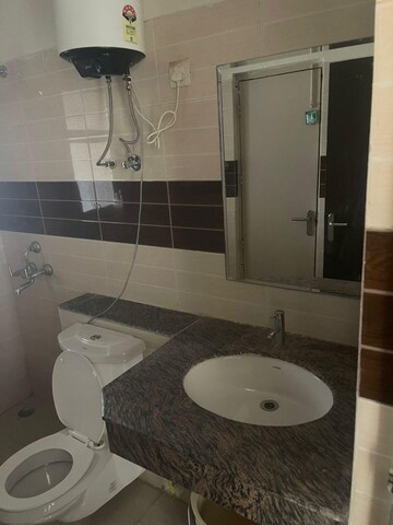 Bathroom in 3 BHK Apartment at Ramprastha Awho, Sector 95 – for Rent