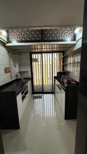 Kitchen in 2 BHK Apartment at Cosmos Solitaire, Virar West – for Rent