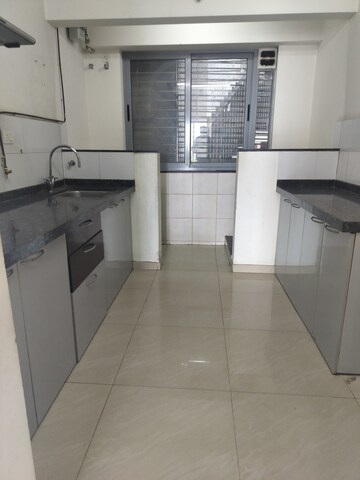 Kitchen in 3 BHK Apartment at Amanora Future Towers, Hadapsar – for Rent