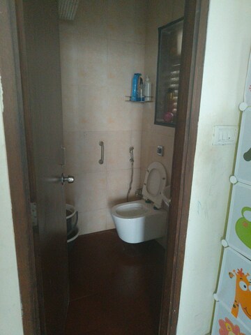 Bathroom in 2 BHK Apartment at Ruparel Iris, Matunga West – for Rent