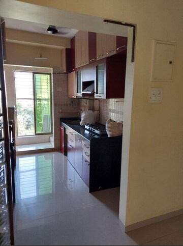 Kitchen in 2 BHK Apartment at Dedhia Palatial Height, Powai – for Rent