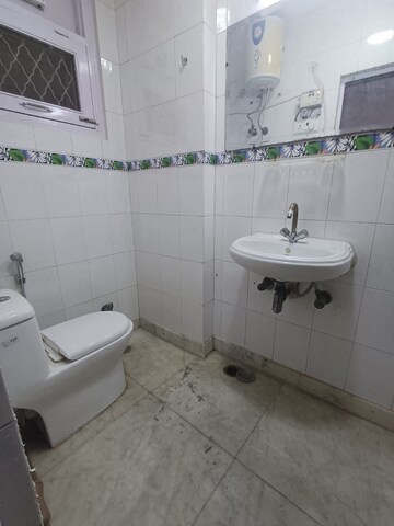 Bathroom in 2 BHK Builder Floor at Nandini Apartments Burari, Burari – for Rent