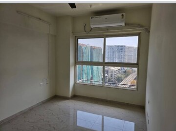 Room in 1 BHK Apartment at Romell Rhythm, Malad West – for Rent