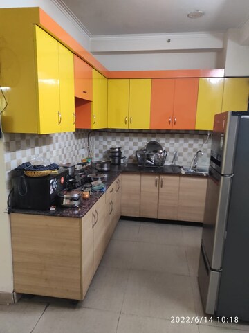 Kitchen in 2 BHK Apartment at Mahagun Mywoods, Sector 16c Greater Noida – for Rent