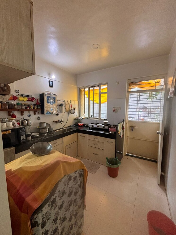 Kitchen, bk-tranquility-row-house-i 3.5 Bedroom 1500 Sq.Ft. Independent House In Manjari Pune 8817419