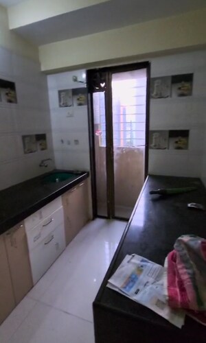 Kitchen in 1 BHK Apartment at Sri Dutt Garden Avenue K, Virar West – for Sale