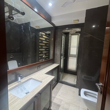 Bathroom in 4 BHK Builder Floor at Gulmohar Park – for Rent