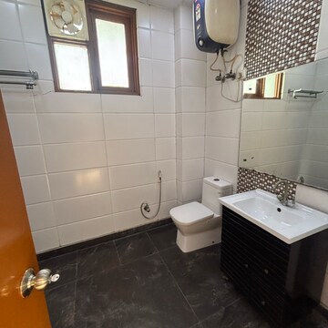 Bathroom in 4 BHK Builder Floor at South Extension ii – for Rent