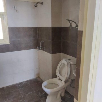 Bathroom in 2 BHK Apartment at SVP Gulmohur Garden, Raj Nagar Extension – for Rent