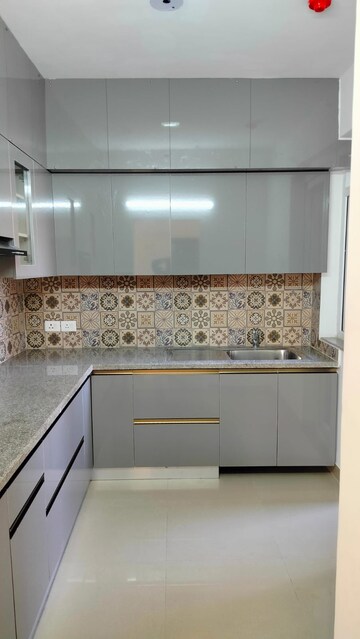 Kitchen in 2 BHK Apartment at Signature The Millennia 2, Sector 37d – for Rent