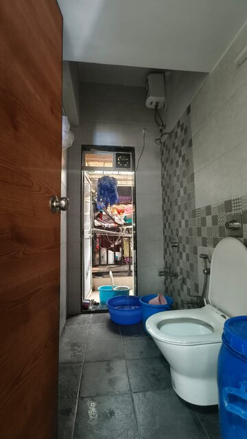 Bathroom in 2 BHK Apartment at Shree Krupa Keshav Heights Phase II, Kalwa – for Rent