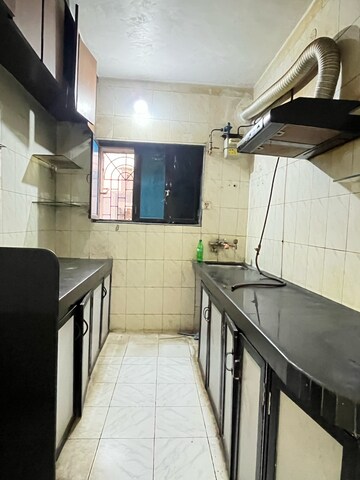Kitchen in 1 BHK Apartment at Brahmand CHS, Brahmand – for Rent