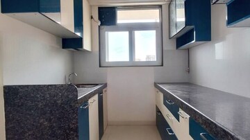 Kitchen in 2 BHK Apartment at Ashar Axis, Majiwada – for Rent