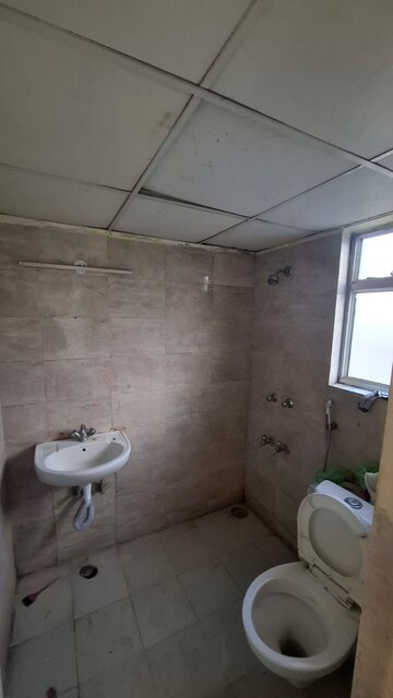Bathroom in 3 BHK Apartment at Wave Dream Homes, Wave City – for Rent