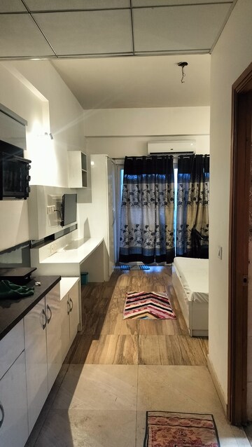 Living Room in 1 BHK Apartment at Paramount Golfforeste, Zeta I Greater Noida – for Rent