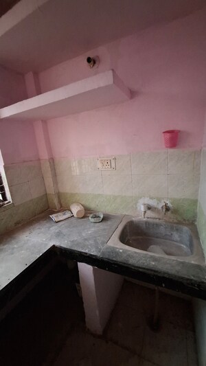 Kitchen in 1.5 BHK Apartment at Sector 10 Greater Noida – for Sale