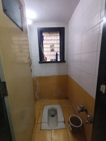 Bathroom in 2 BHK Apartment at Dombivli West – for Rent