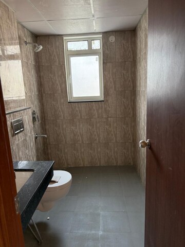 Bathroom in 4 BHK Apartment at Shapoorji Pallonji Joyville Gurgaon, Sector 102 – for Rent