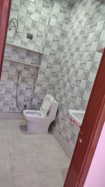 Bathroom in 3 BHK Builder Floor at Dwarka Mor – for Rent