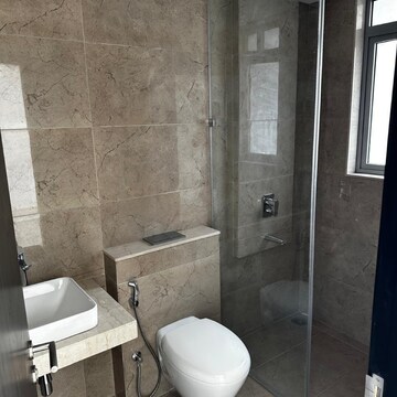 Bathroom in 3 BHK Apartment at Oberoi Sky City, Khande Rao Dongari – for Rent