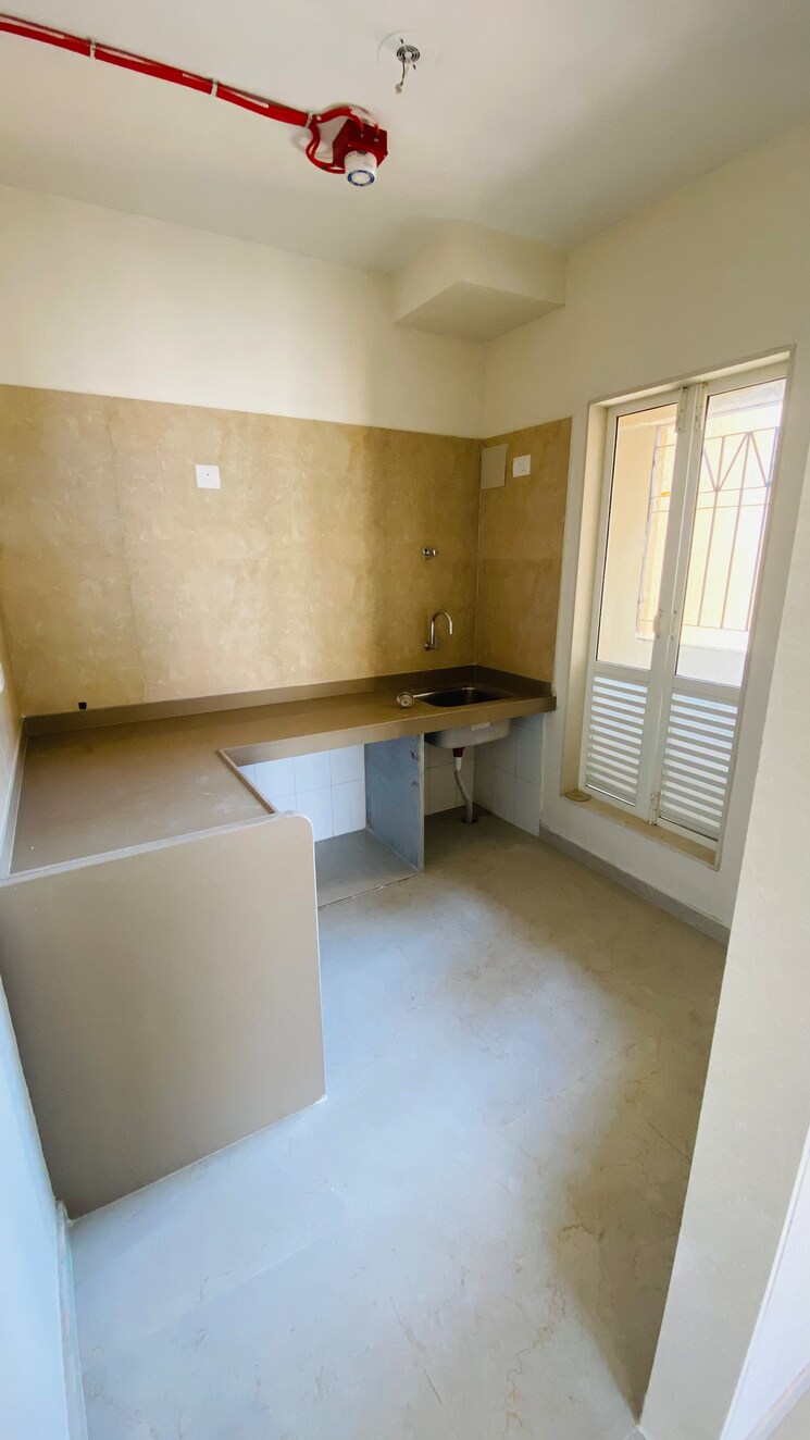 Kitchen, dosti-west-county-phase-4-dosti-pine 2 Bedroom 695 Sq.Ft. Apartment In Balkum Pada Thane 8822659