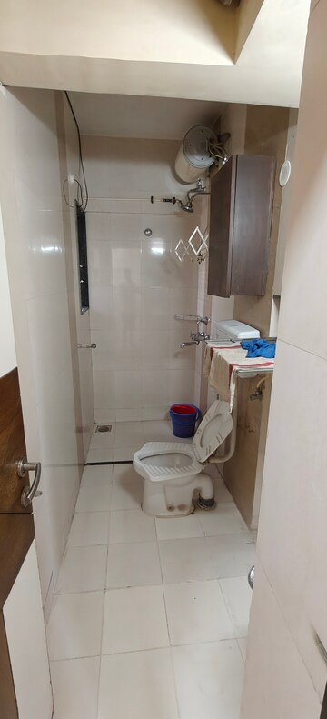 Bathroom in 3 BHK Apartment at Model Colony – for Rent
