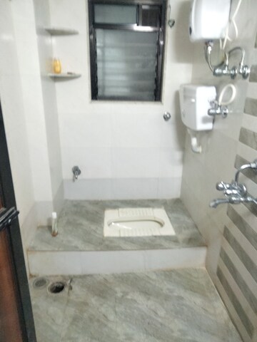 Bathroom in 1 BHK Apartment at Riddhi Garden, Malad East – for Rent