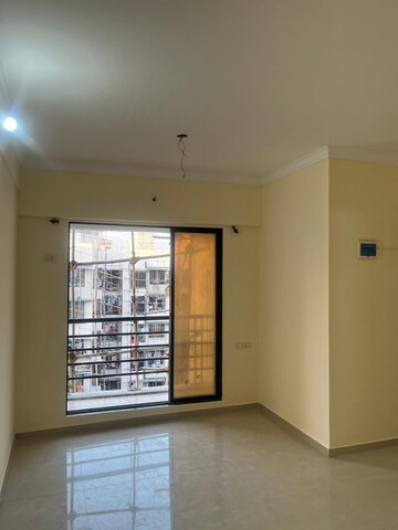 Room in 1 BHK Apartment at DB Orchid Ozone, Dahisar East – for Rent