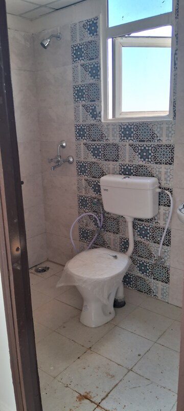 Bathroom in 2 BHK Apartment at Signature Global Proxima, Sector 89 – for Rent