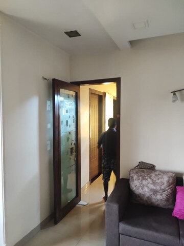 Living Room in 2 BHK Apartment at JP Decks, Goregaon East – for Rent