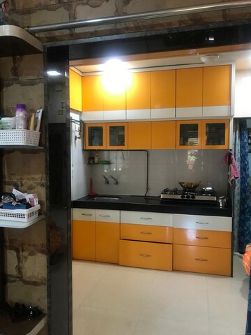 Kitchen in 2 BHK Apartment at Omkar Alta Monte, Malad East – for Rent