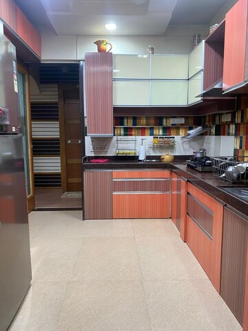 Kitchen in 2 BHK Apartment at Omkar Alta Monte, Malad East – for Rent