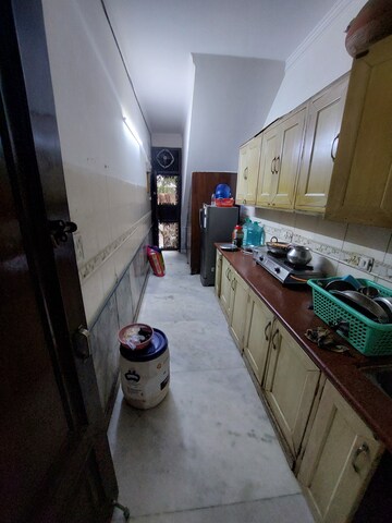 Kitchen in 2 BHK Builder Floor at RWA Parmanand, Mukherjee Nagar – for Sale