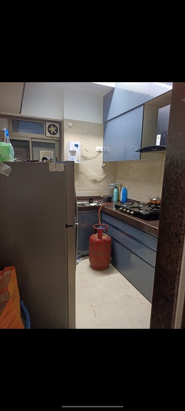 Kitchen in 2 BHK Apartment at Chandak Cornerstone, Worli – for Rent