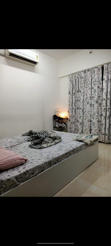 Bedroom in 2 BHK Apartment at Chandak Cornerstone, Worli – for Rent