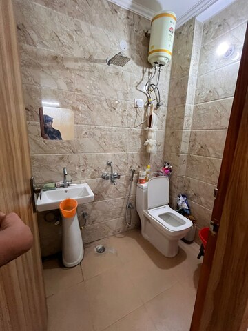 Bathroom in 1 BHK Builder Floor at Freedom Fighters Enclave – for Rent