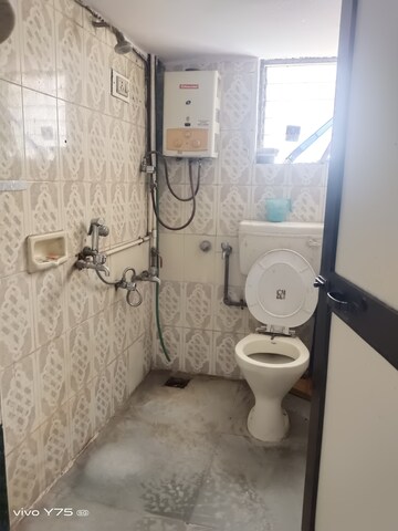 Master Bedroom in 1 BHK Apartment at Runwal Tower, Uthalsar – for Rent