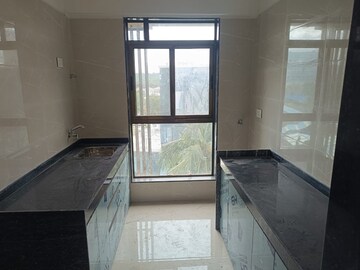 Kitchen in 2 BHK Apartment at Sheth Irene, Malad West – for Rent