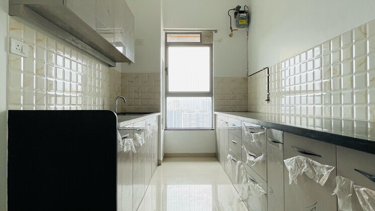 Kitchen, kalpataru-immensa 2 Bedroom 538 Sq.Ft. Apartment In Kolshet Road Thane 8823556