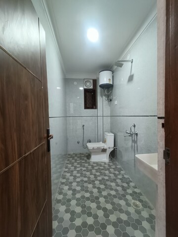 Bathroom in 3 BHK Builder Floor at Khirki Extension – for Sale