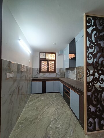 Kitchen in 3 BHK Builder Floor at Khirki Extension – for Sale