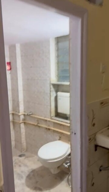 Bathroom in 1 BHK Apartment at Janki Niwas Malad, Malad East – for Rent