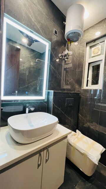 Bathroom in 3 BHK Builder Floor at Adani Samsara Vilasa, Sector 63 – for Sale