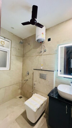 Bathroom in 3 BHK Builder Floor at Adani Samsara Ivana, Sector 63 – for Sale