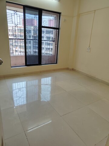 Living Room in 1 BHK Apartment at Bhumiraj Woods, Kharghar – for Sale